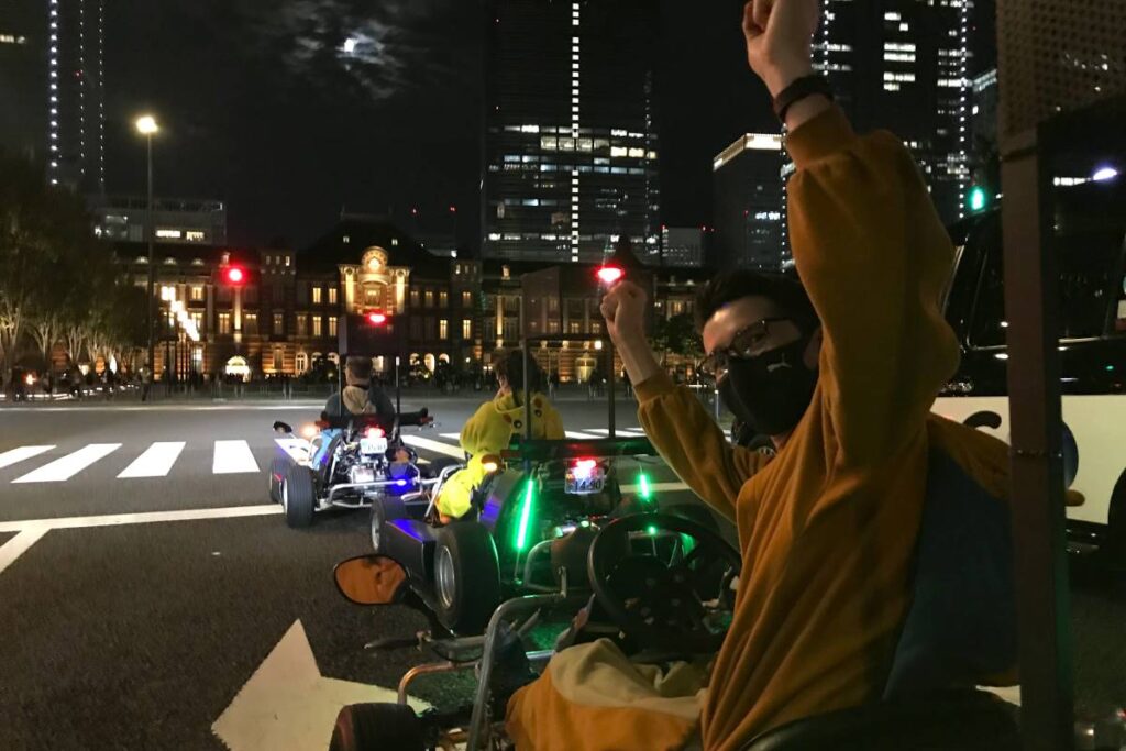 tokyo-karts-driving-past-tokyo-station